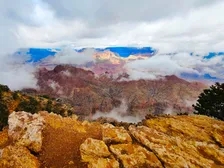 Sunrise clouds drifting through the Grand Canyon